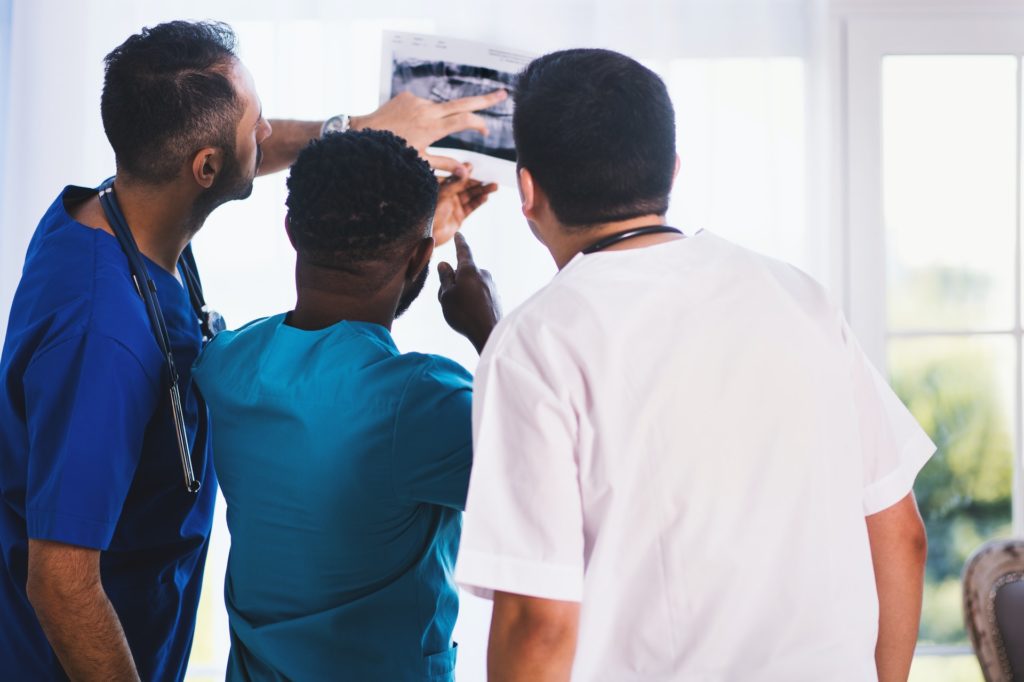 doctors examining an x-ray